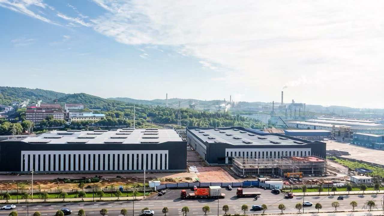 Aerial view of the QM Mill Liners foundry — two production halls in Dangyang, Hubei